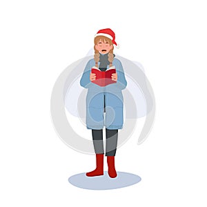 Happy woman Singing Christmas Song in Winter Costumes. woman in Festive Winter Attire Singing Christmas Carols