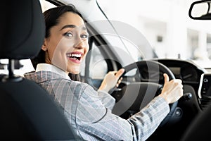 Happy Woman Sitting In Her New Auto