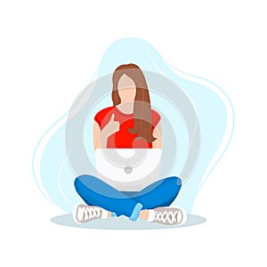 Happy woman sitting on yoga lotos pose with laptop and giving thumbs up.