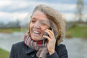 Happy woman smiling with pleasure