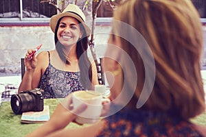 Happy Woman Smoking Electronic Cigarette Drinking Coffee In Bar