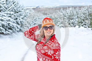 Happy woman in a snow landscape