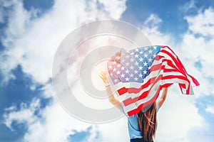 Happy woman standing with American flag Patriotic holiday.USA ce