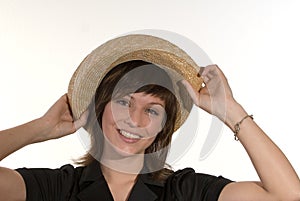 Happy woman in straw hat