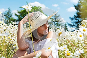 Happy woman in summer field. Young girl relax outdoors. Freedom concept.