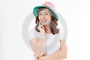 Happy woman in summer hat isolated on white background. Sun protection skin care and vacation holidays concept. Middle age female