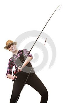 Happy woman in sun hat holding fishing rod