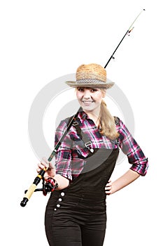 Happy woman in sun hat holding fishing rod