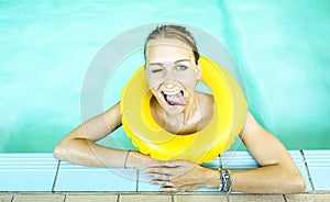 Happy woman at swimming pool with bigmouth expression