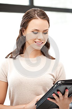 Happy woman with tablet pc computer