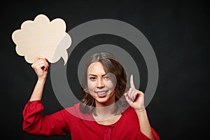 Happy woman with thought bubble