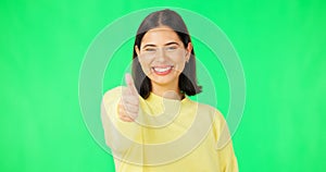 Happy woman, thumbs up and green screen for winning, success or agreement against a studio background. Portrait of