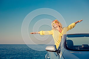 Happy woman travel by car