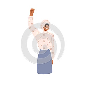 Happy woman in turban with fist raised up. Strong female and solidarity with girls power, rights. Muslim feminist in
