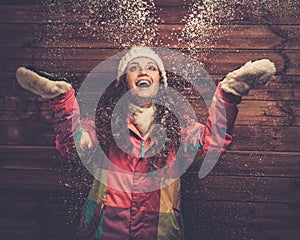 Happy woman under snow