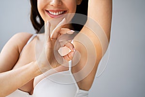 Happy Woman With Underarm Armpit After Waxing photo