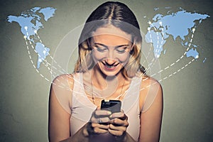 Happy woman using smartphone browsing internet worldwide