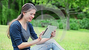 Happy woman using a tablet pc