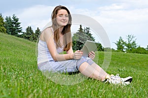 Happy woman using touchpad tablet