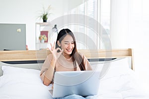 Happy woman using video conference call to people,Work from home,Work at home,New normal concept photo