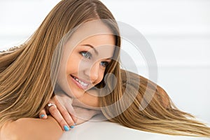 Happy woman with varicolored eyes