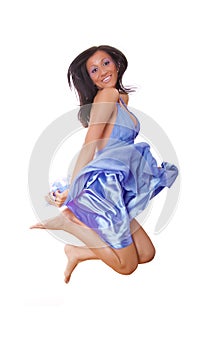 Happy Woman In Violet Silk Dress Jumping