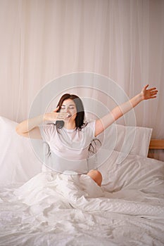 Happy woman waking up after good sleeping