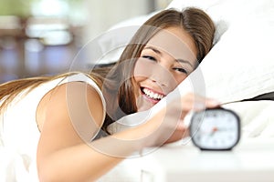Happy woman waking up having a good day photo