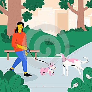 Happy woman walking with dog on leash in city park