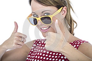 Happy Woman Wearing Yellow Sun Glasses Giving Thumbs Up