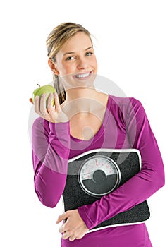 Happy Woman With Weight Scale And Smith Apple