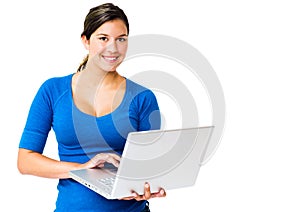 Happy woman working on laptop