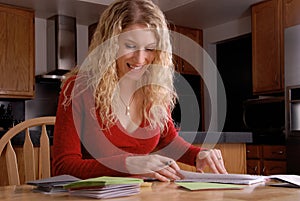 Happy woman writing