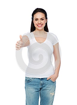 Happy womanin white t-shirt showing thumbs up