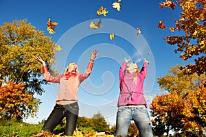 Happy Women at autumn outdoors