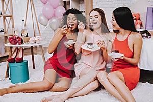 Happy Women Eating Cake Celebrating Women`s Day.