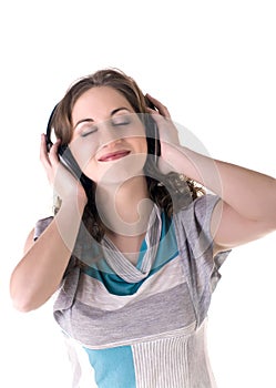 Happy women listening music in headphones