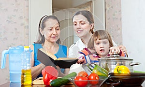 Happy women reads cookbook