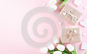 Happy women`s day concept, Beautiful tulips, gift box with heart on pastel background