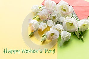 Happy women's day greeting card. Postcard on March 8. Layout with spring eustoma flowers. Flat lay, top view