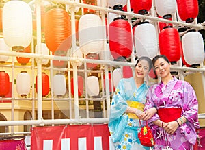 Happy women wearing traditional kimono