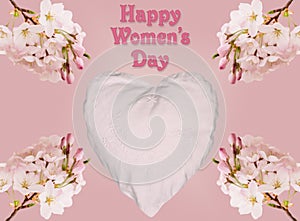 Happy Womens Day background with heart and blossoms