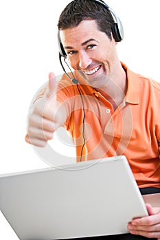 Happy work at home male working on laptop smiling