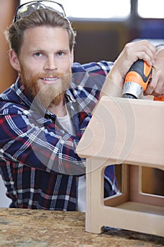 happy worker on house project