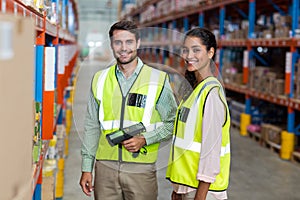 Happy workers are smiling and posing during work