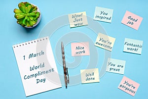 Happy World Compliment Day. Office desk with plant, notebook, pen and paper slips with compliments text for office worker such as