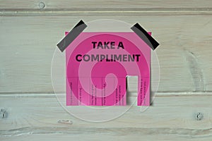 Happy World Compliment Day. Take a compliment. Pink wall paper sticker with text of popular compliments for beautiful lady pasted