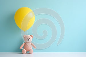 Happy Yellow Teddy Bear Sitting on a Beautiful Pastel Background with Copy Space for Text