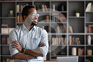 Happy young african american businessman feeling excited about new opportunities.