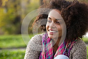 Happy young african american woman smiling outdoors